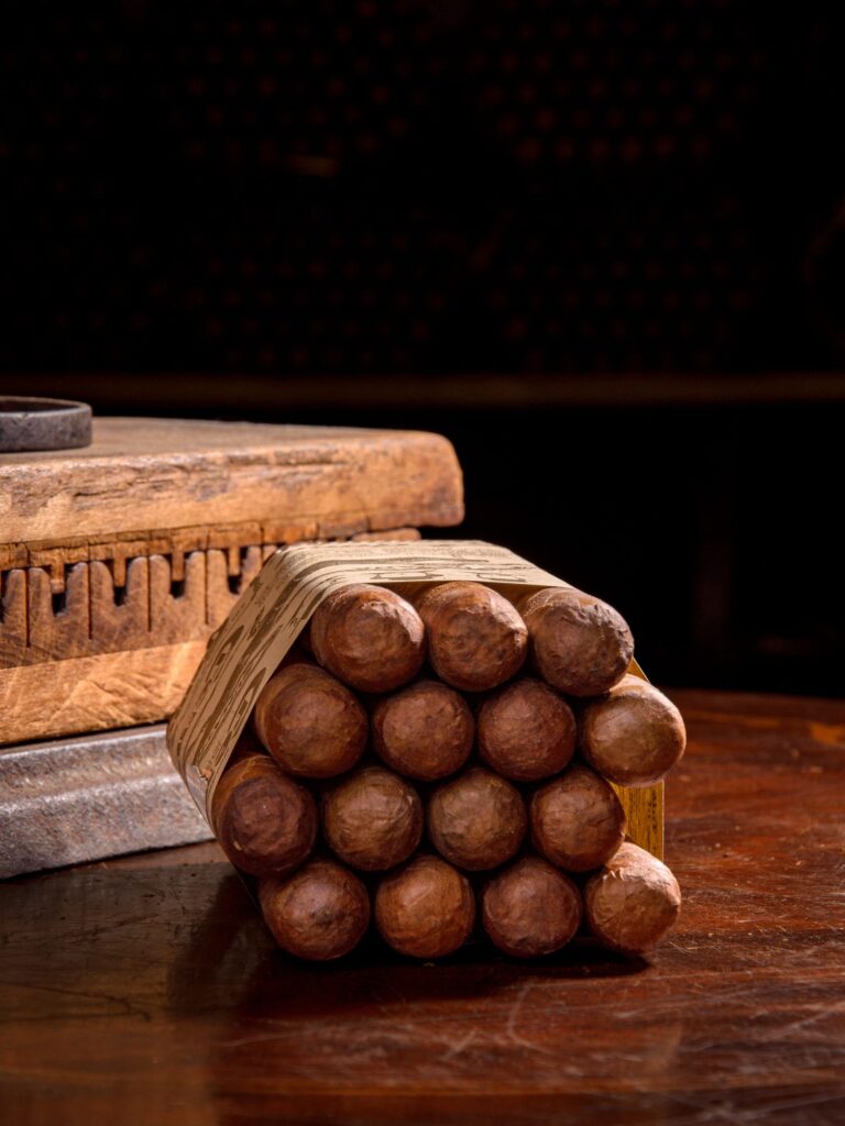 Cremo Habano Factory Select — bundle of 15 Toro cigars in Cremo newsprint wrap